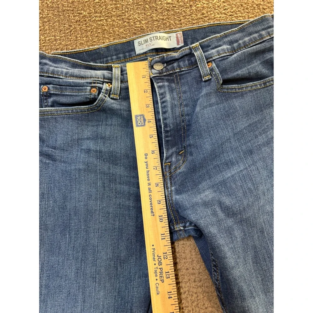 Levis 513 Slim Straight Jeans Mens 34x32 Medium Wash Blue Distressed Denim